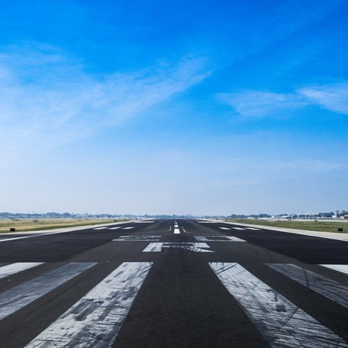 Aircraft on an African airport apron at sunset
